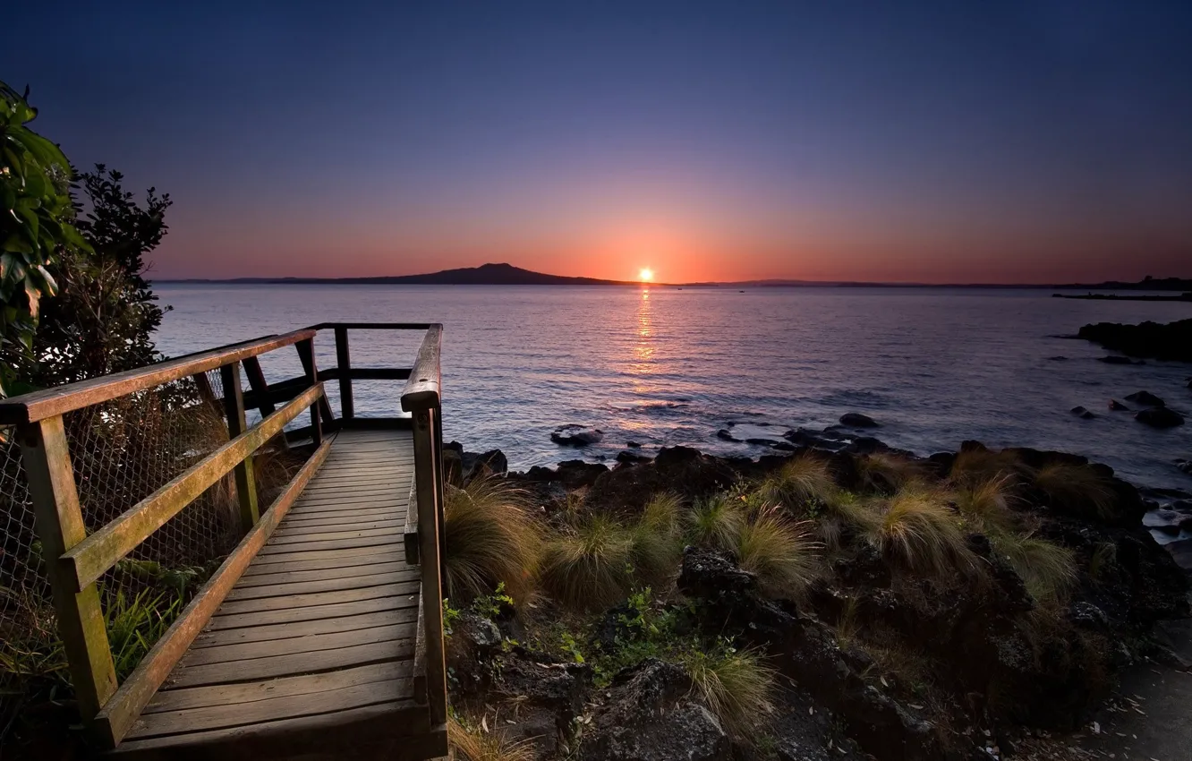 Photo wallpaper water, the sun, sunset, stones, shore, railings