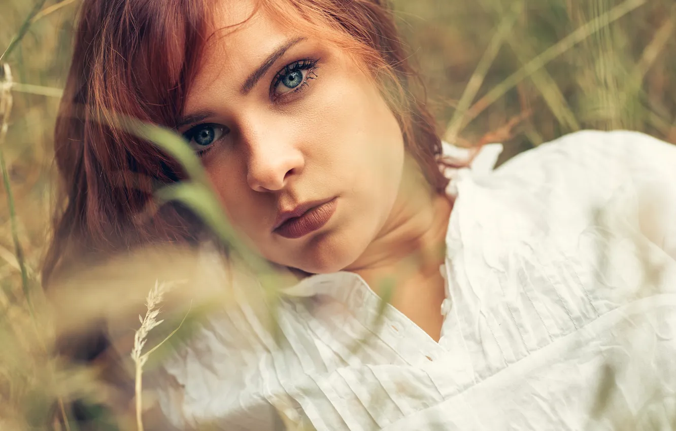 Photo wallpaper grass, eyes, girl, hair, red, beautiful