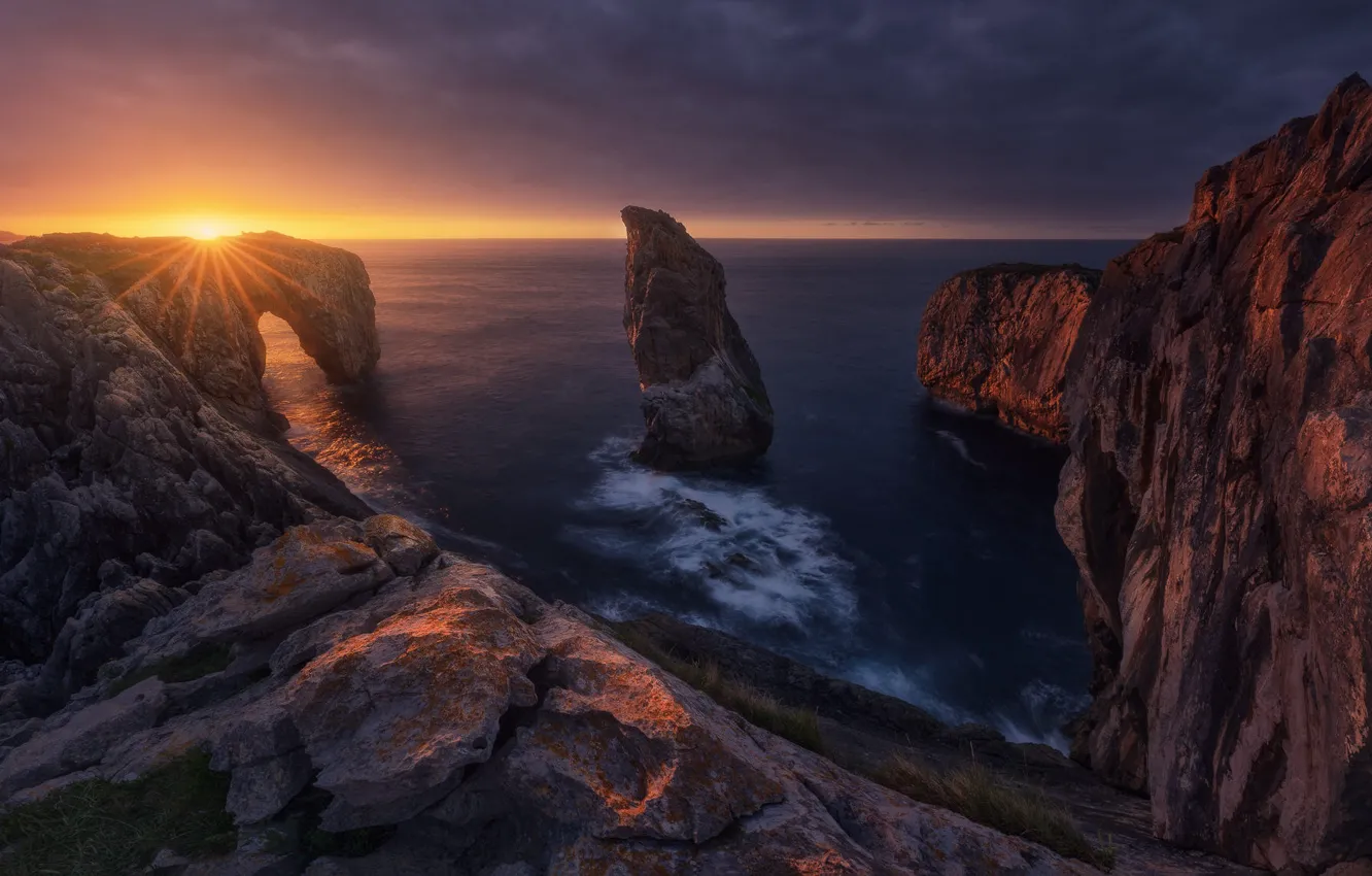 Photo wallpaper sea, the sky, the sun, rays, light, sunset, clouds, stones