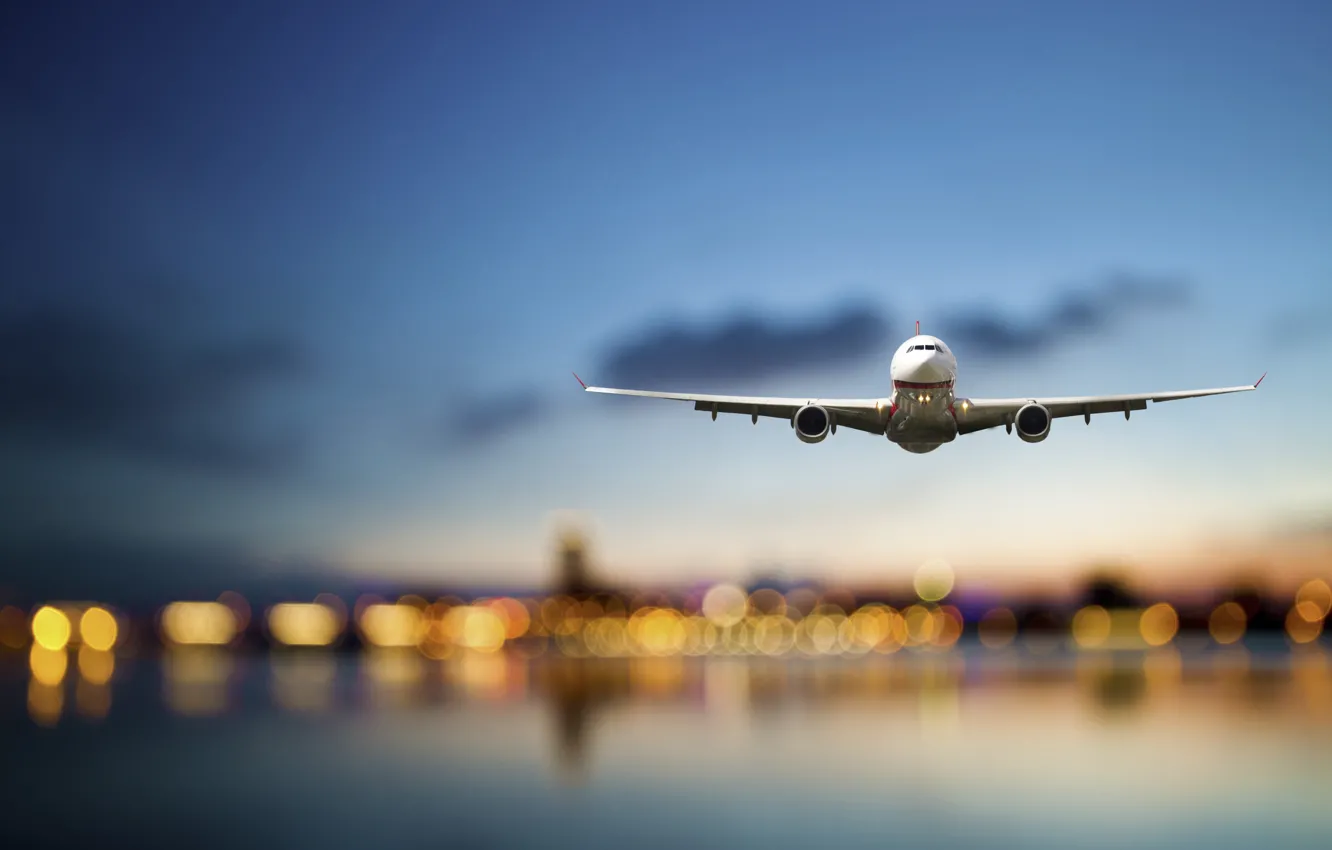 Photo wallpaper sea, the sky, flight, the city, lights, height, the evening, blur