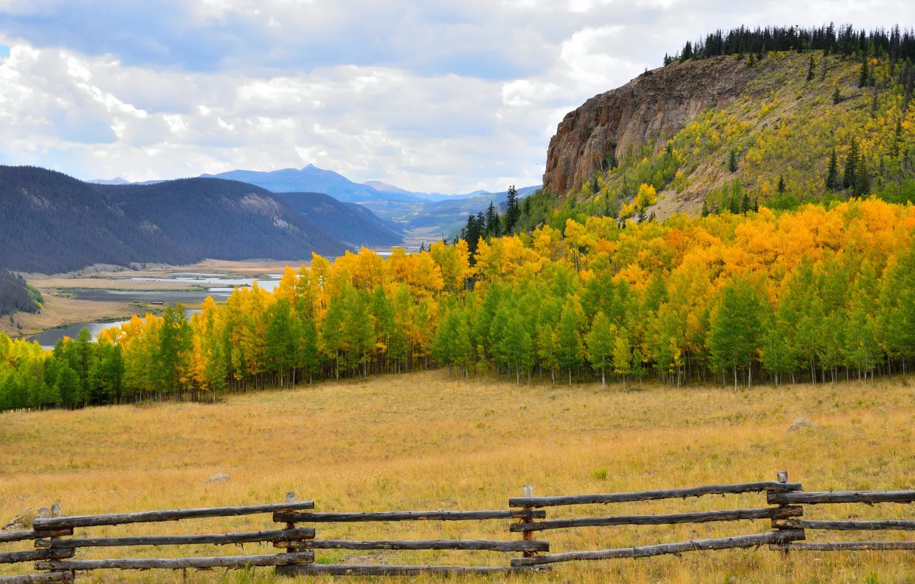 Photo wallpaper field, autumn, the sky, grass, trees, mountains, river, the fence