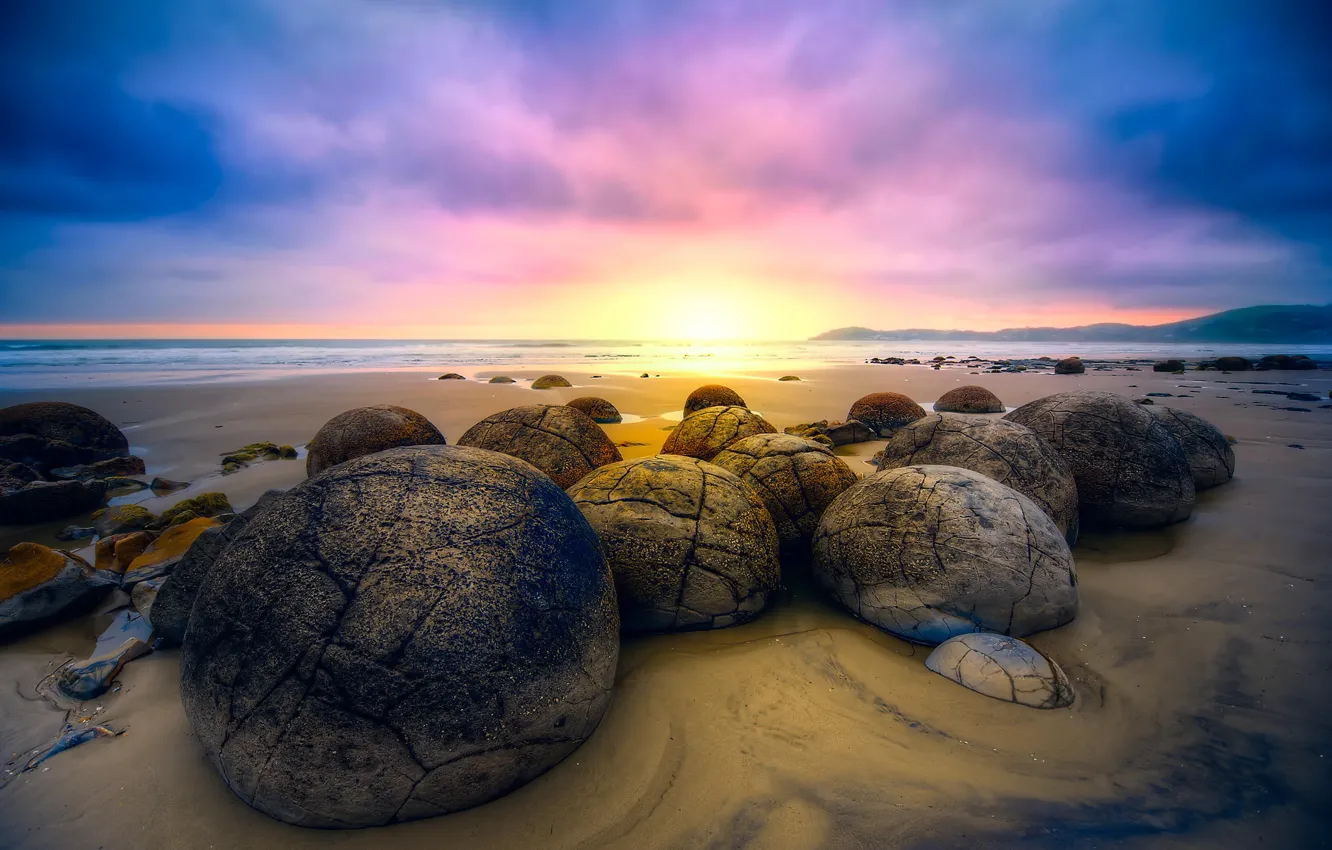 Photo wallpaper sand, beach, the sky, sunrise, stones, the ocean, New Zealand, Moeraki Boulders