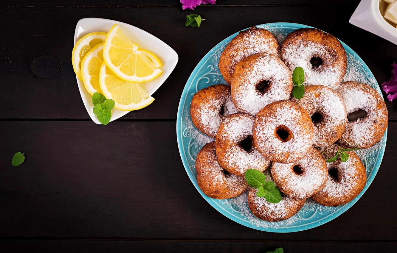 Photo wallpaper plate, donuts, slices, powdered sugar, lemon