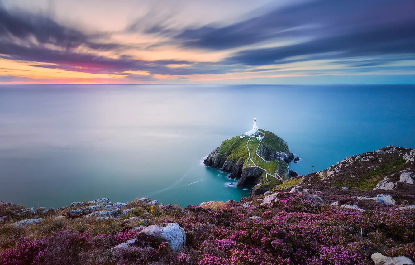 Photo wallpaper sea, the sky, clouds, flowers, stones, shore, lighthouse, dal