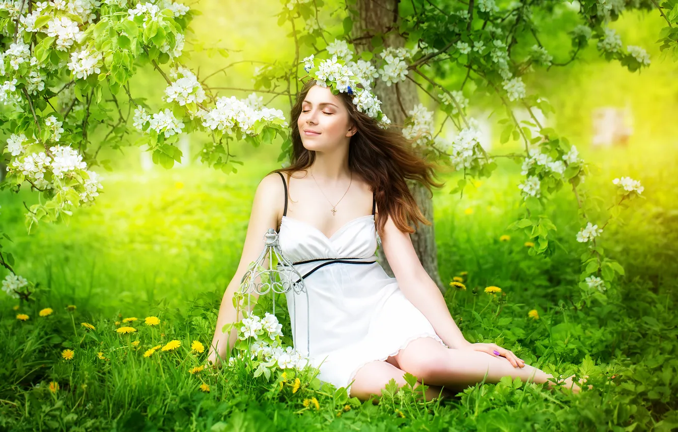 Photo wallpaper girl, flowers, branches, smile, the wind, cell, brown hair, grass. chain