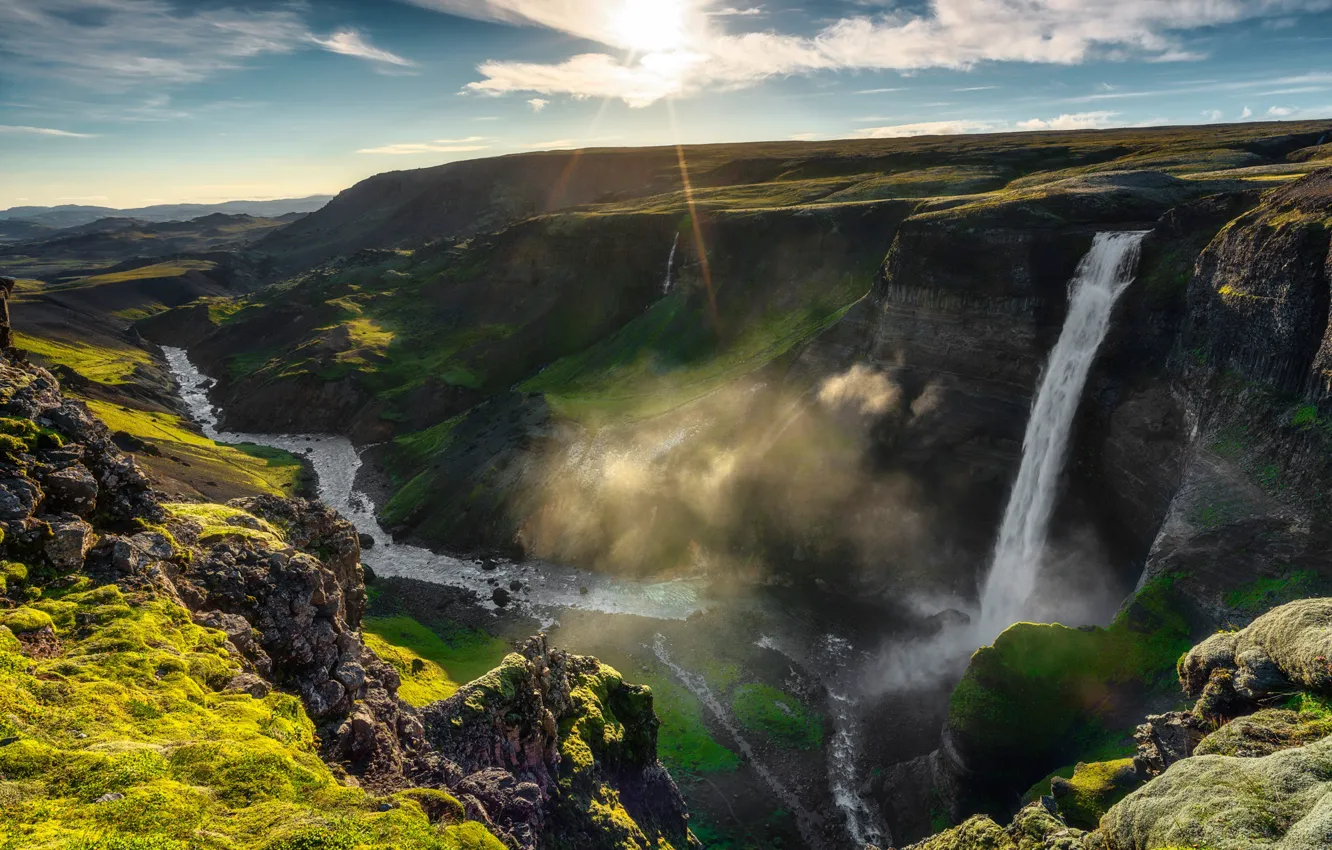 Photo wallpaper the sky, the sun, clouds, river, stones, rocks, waterfall, Iceland