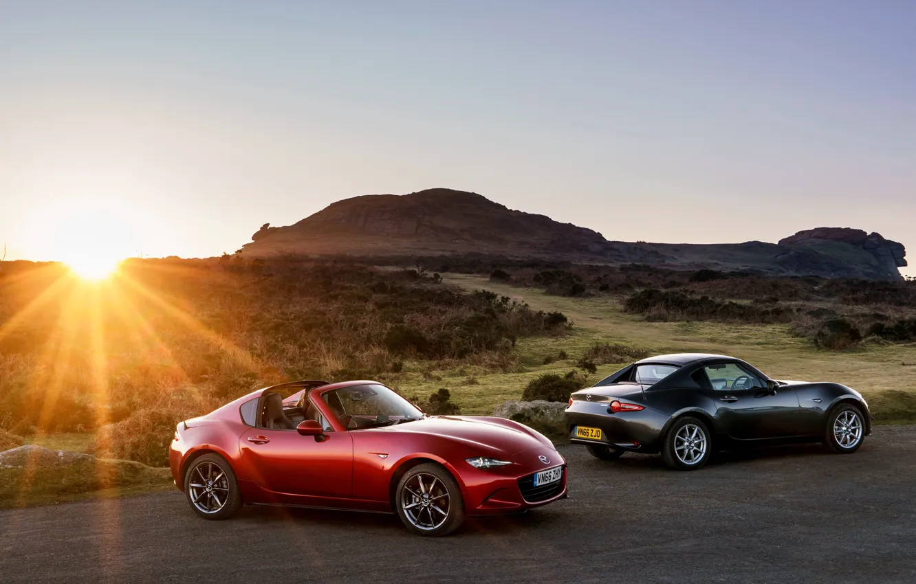 Photo wallpaper rays, sunset, mountains, two, Mazda, convertible, car, Mazda