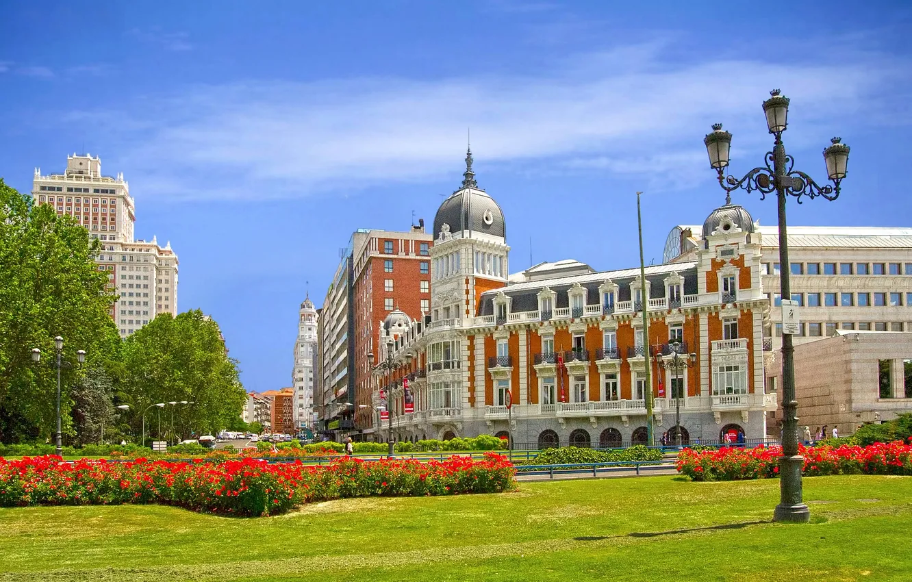 Photo wallpaper the sky, flowers, home, area, Spain, flowerbed