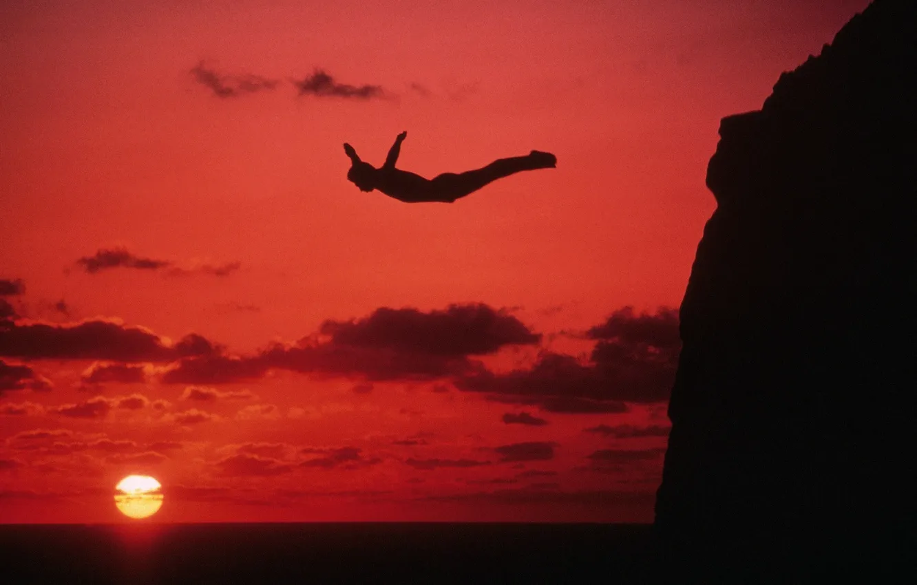 Photo wallpaper sea, sunset, jump, man, cool, cliff