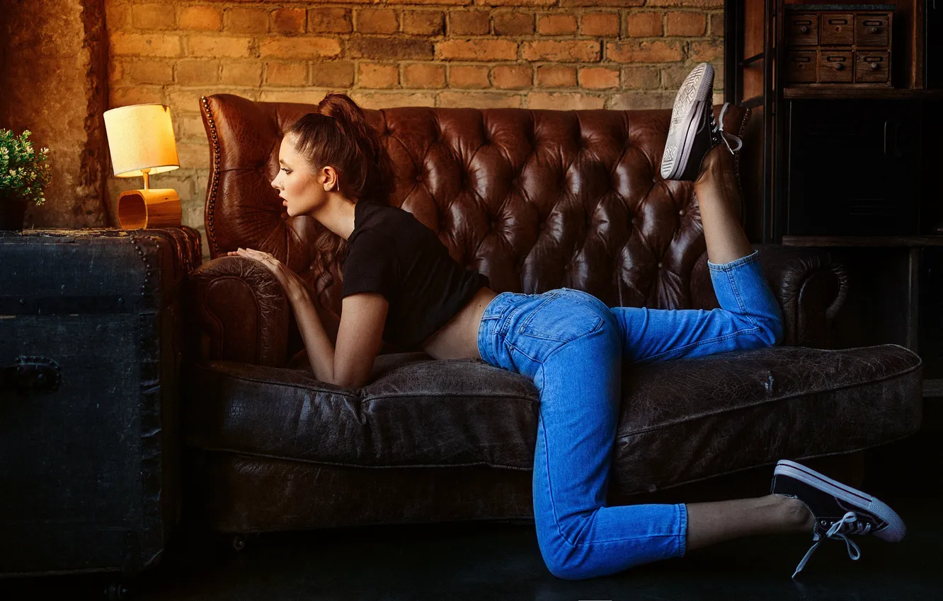 Photo wallpaper pose, wall, model, lamp, sneakers, brick, jeans, makeup