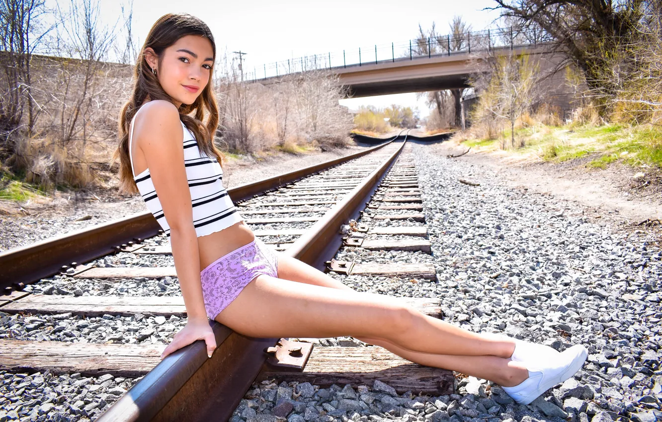 Photo wallpaper legs, model, women, brunette, skinny, legs crossed, looking at viewer, short shorts