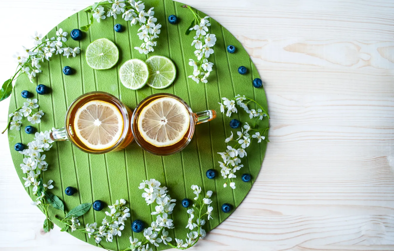Photo wallpaper flowers, glass, berries, table, background, lemon, tea, blueberries