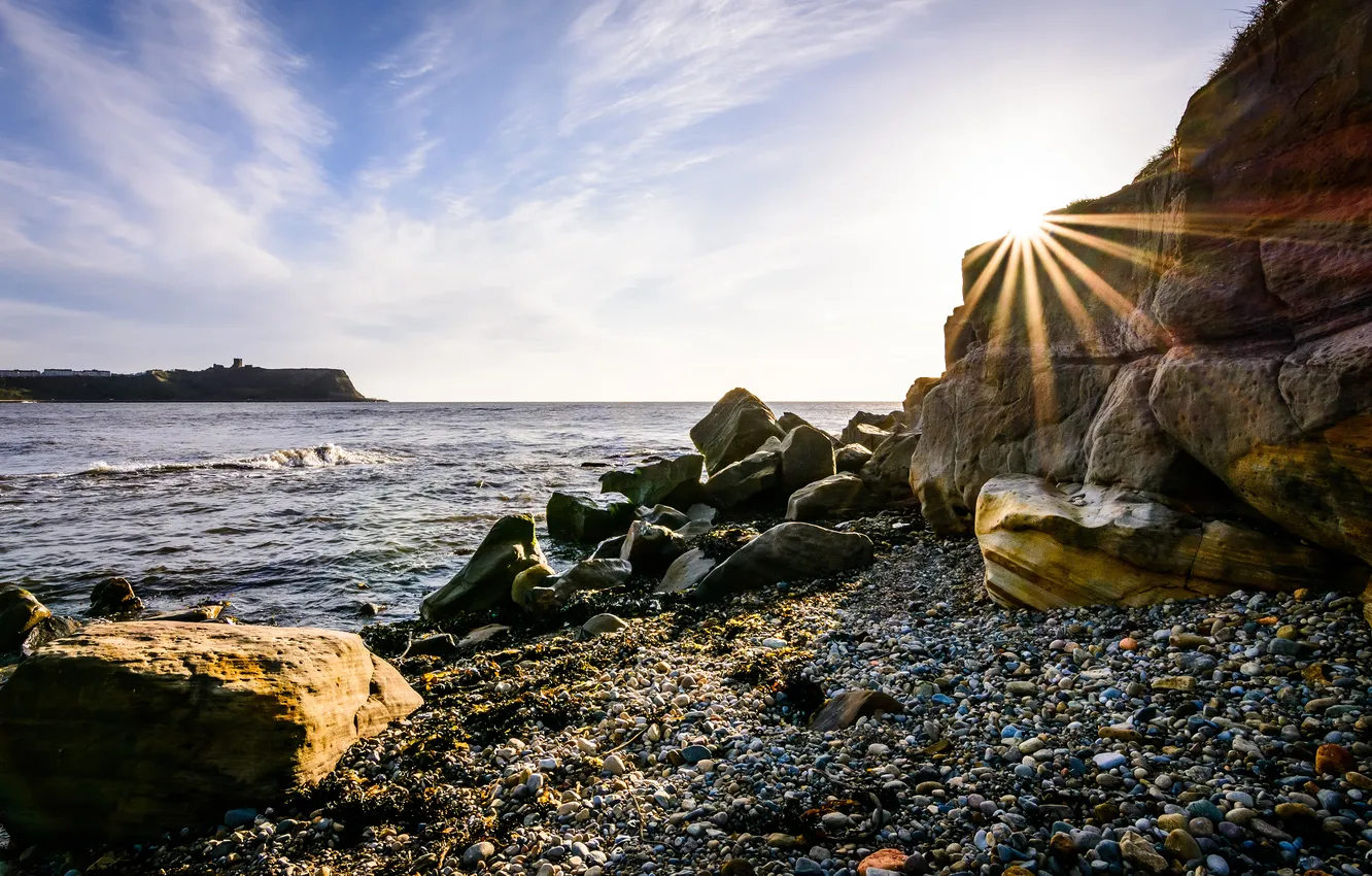 Photo wallpaper sea, the sky, the sun, clouds, rays, pebbles, stones, rocks
