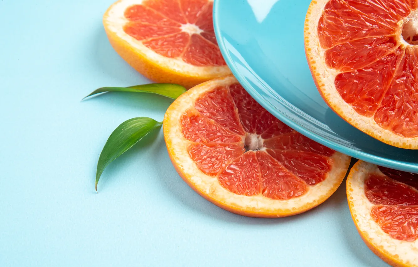 Photo wallpaper leaves, orange, plate, fruit, blue background, slices, composition