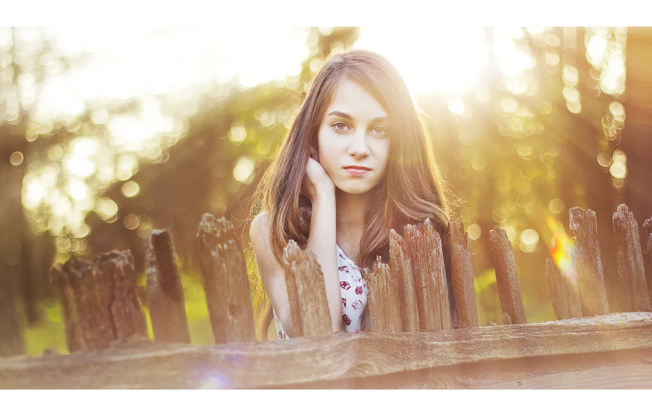 Photo wallpaper girl, the sun, rays, mood, the fence, bokeh.