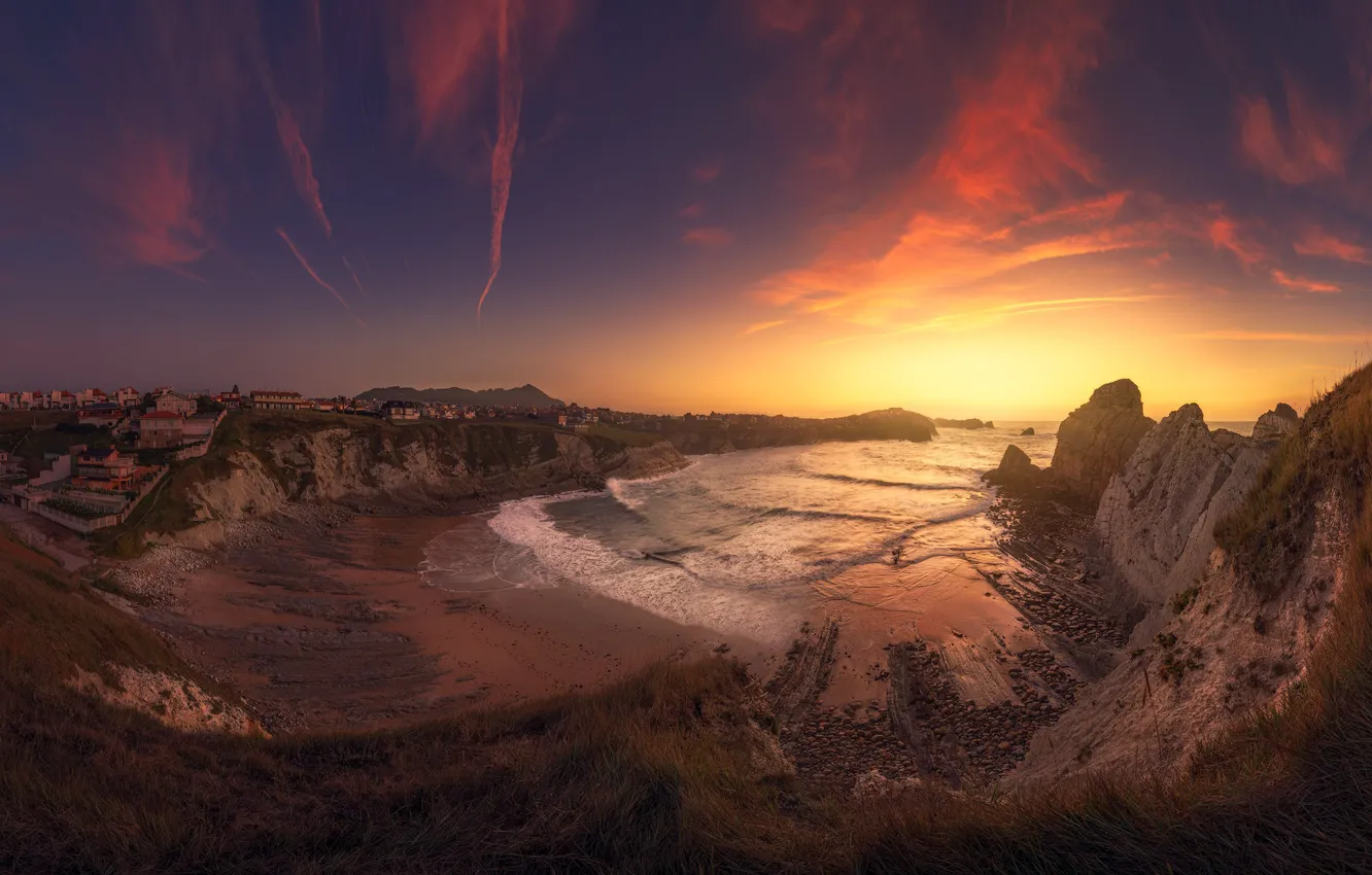 Photo wallpaper sea, sunset, rocks, shore, settlement, tourists
