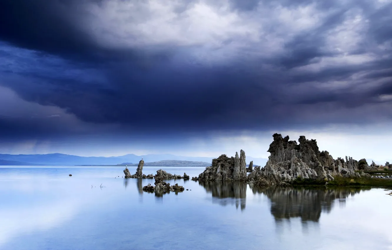 Photo wallpaper the sky, mountains, lake, stones, rocks, horizon