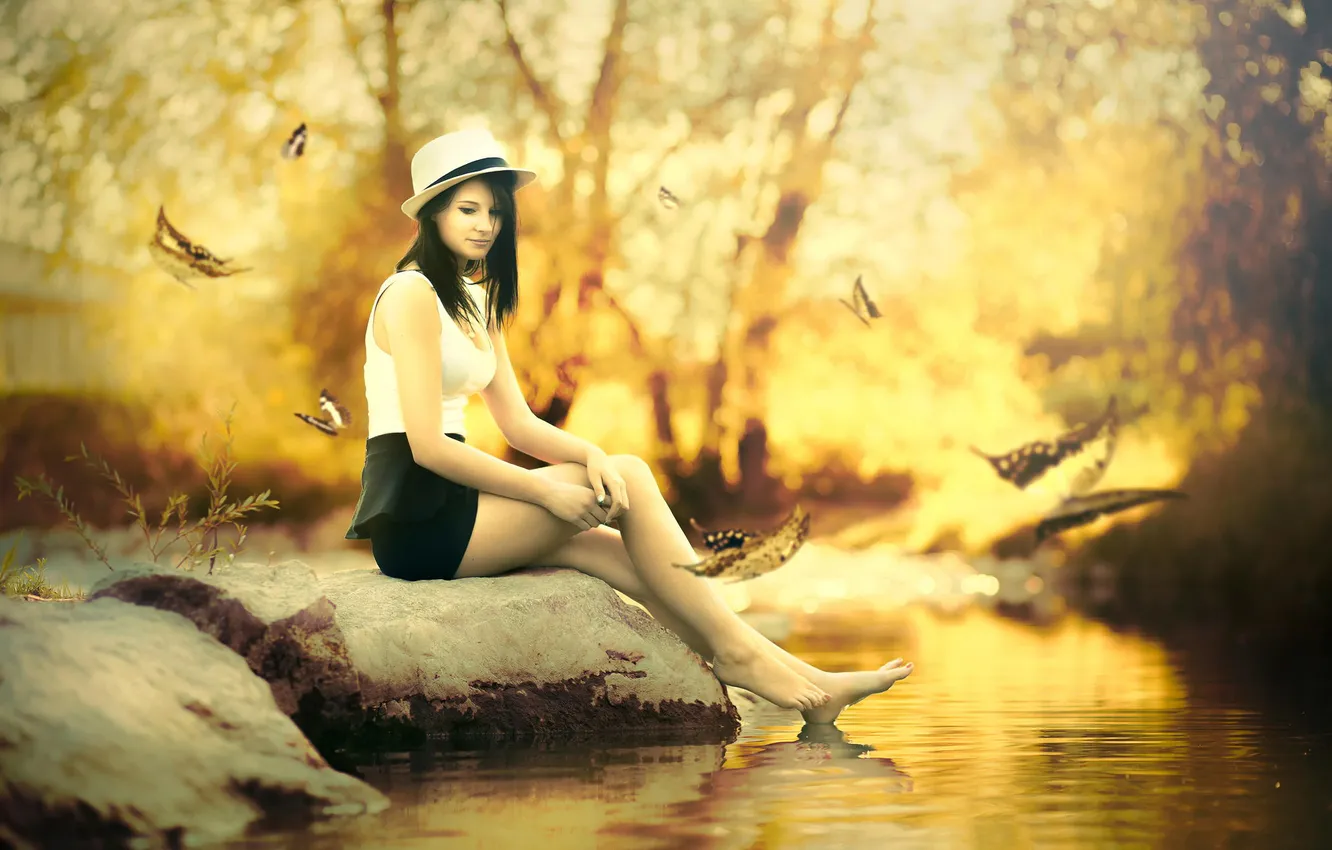 Photo wallpaper autumn, girl, stream, stone, hat, falling leaves