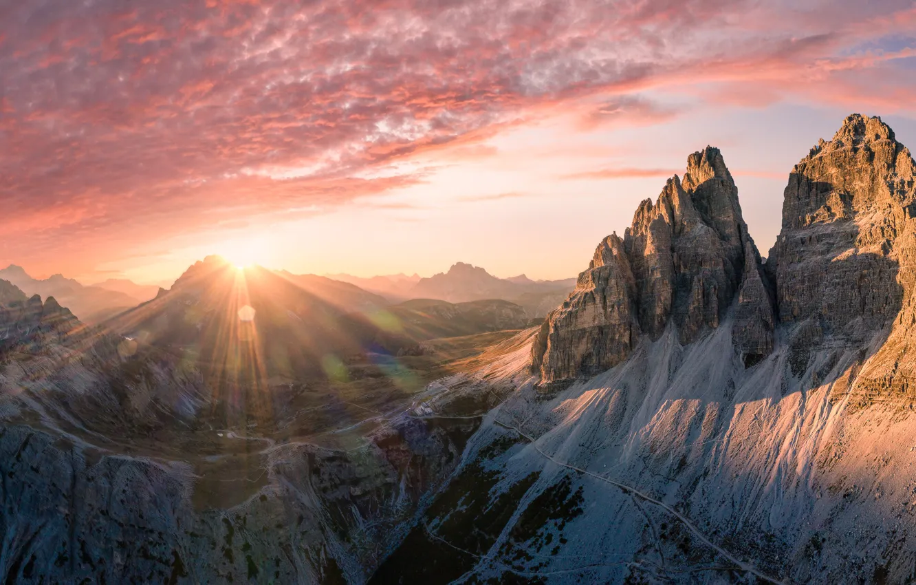 Photo wallpaper the sky, the sun, clouds, rays, mountains, glare, rocks, dawn