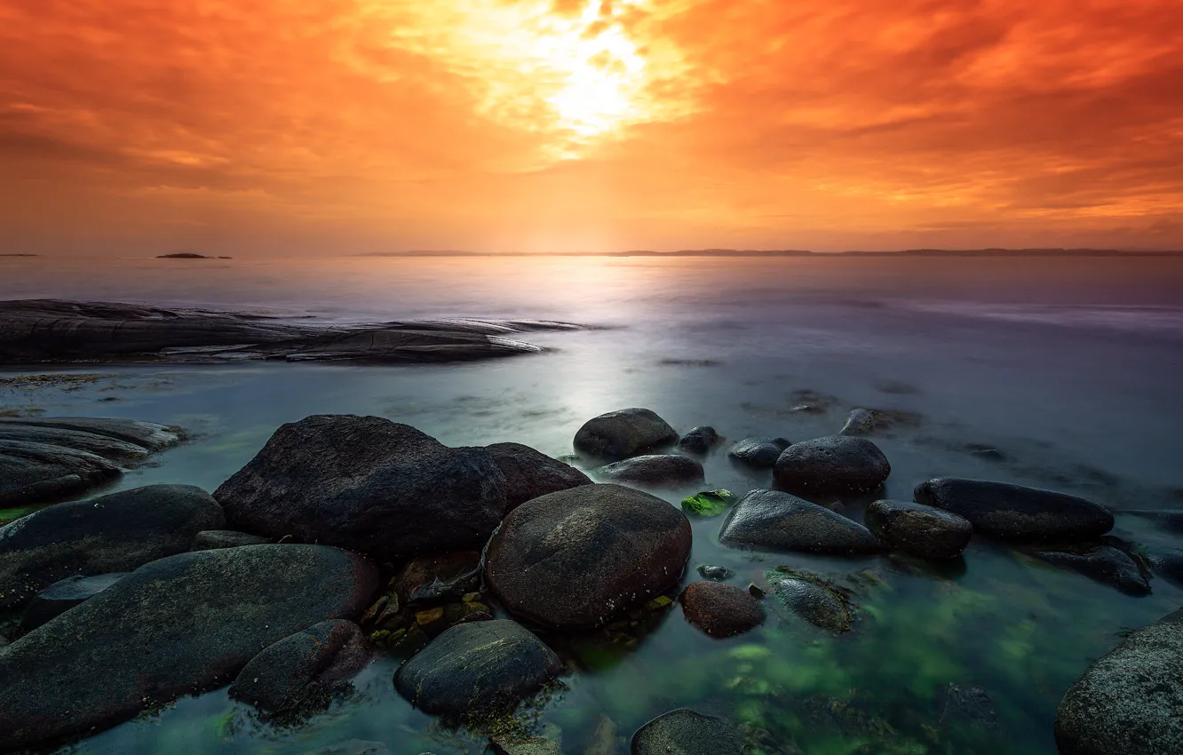 Photo wallpaper sea, the sun, sunset, stones, shore, bright colors, boulders