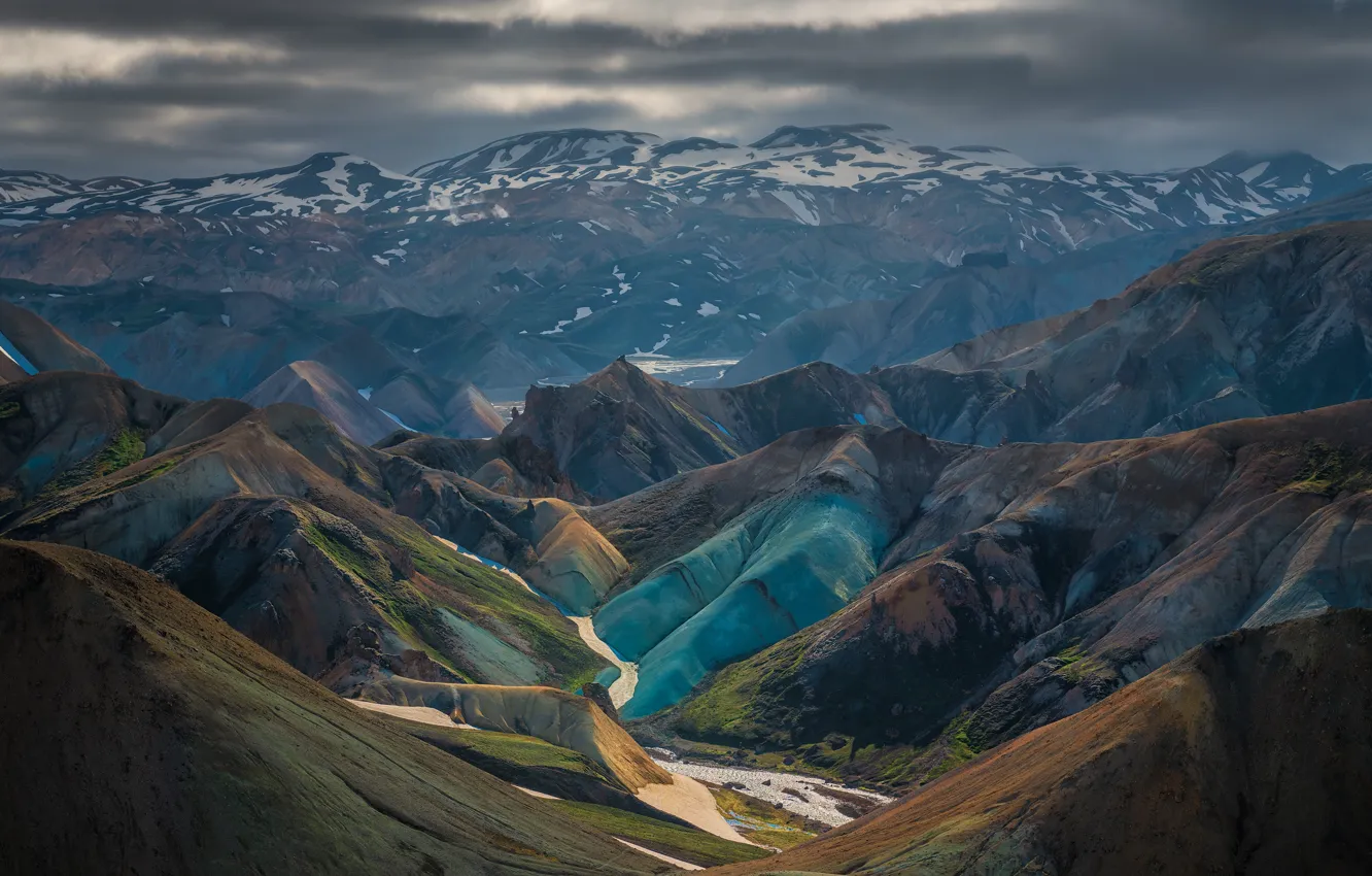 Photo wallpaper snow, mountains, clouds, fog, rocks, tops, haze, relief