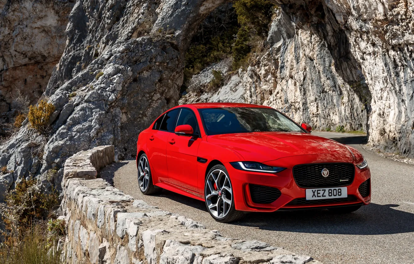 Photo wallpaper mountains, red, Jaguar, arch, sedan, four-door, 2020, Jaguar XE