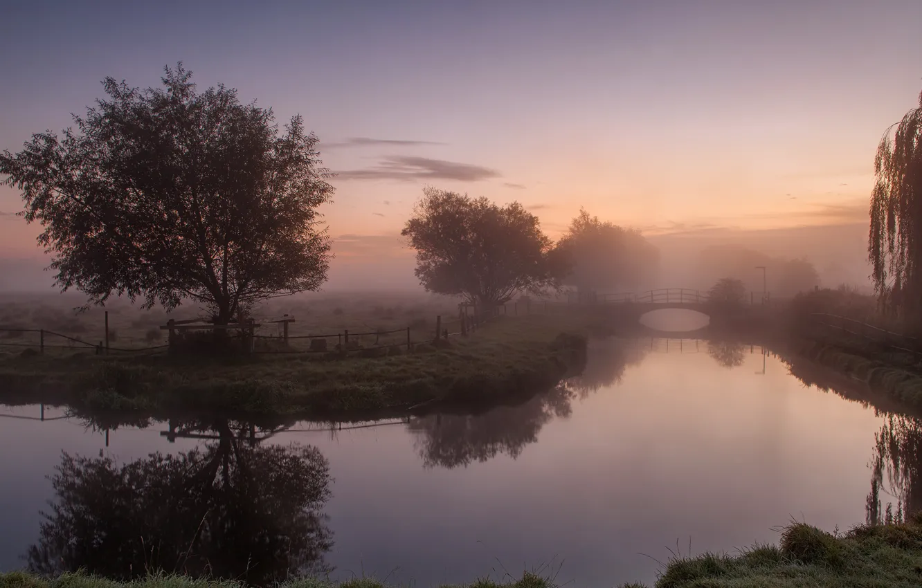 Photo wallpaper the sky, grass, clouds, trees, bridge, fog, river, the fence