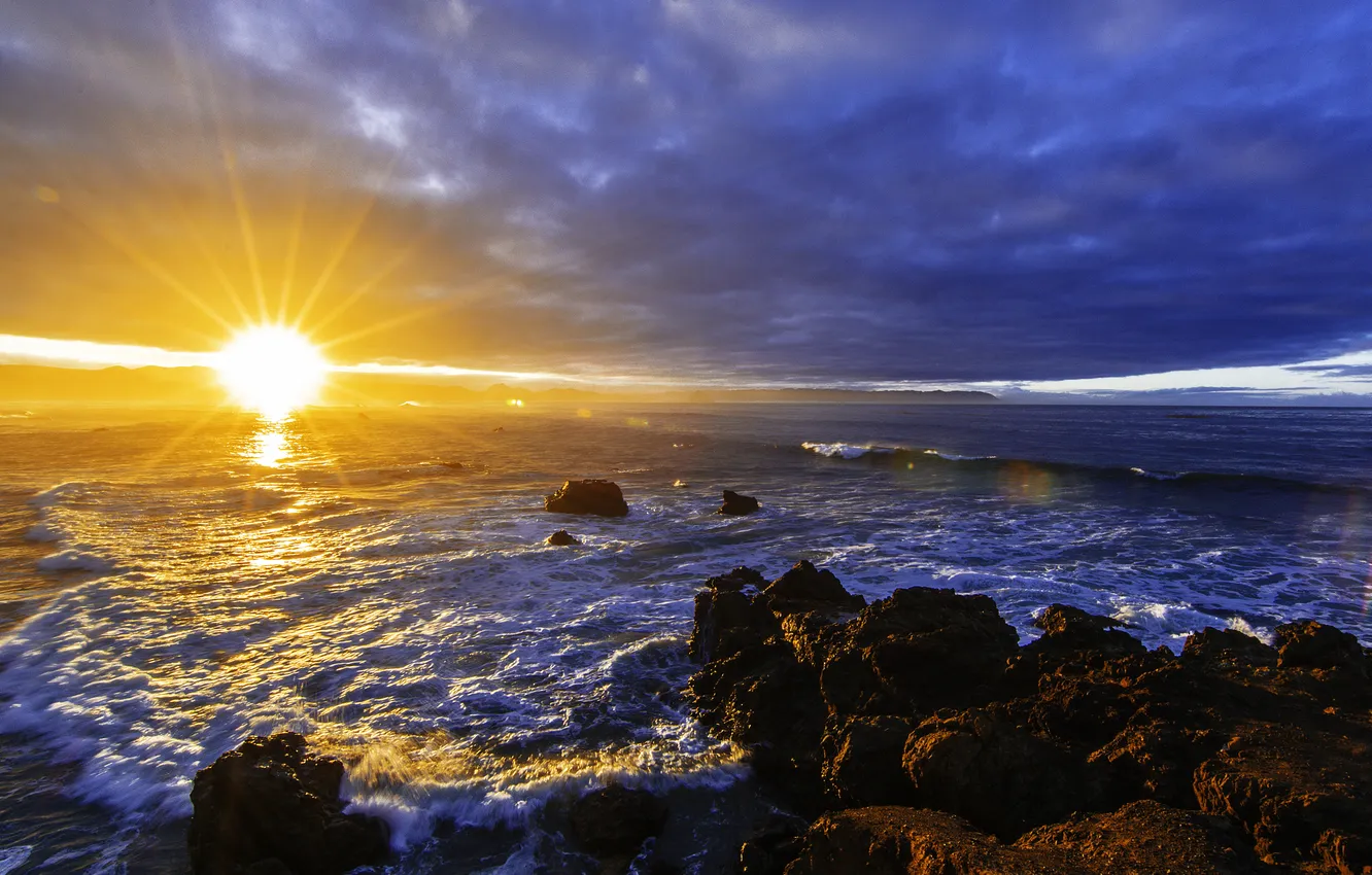 Photo wallpaper sea, wave, clouds, stones, dawn, coast, the rays of the sun