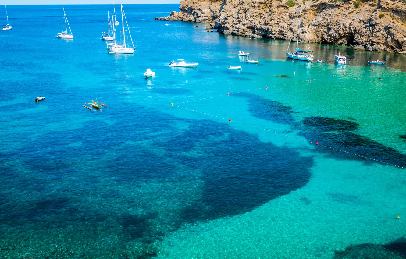 Photo wallpaper sea, tropics, stones, shore, yachts, boats, Spain, Ibiza