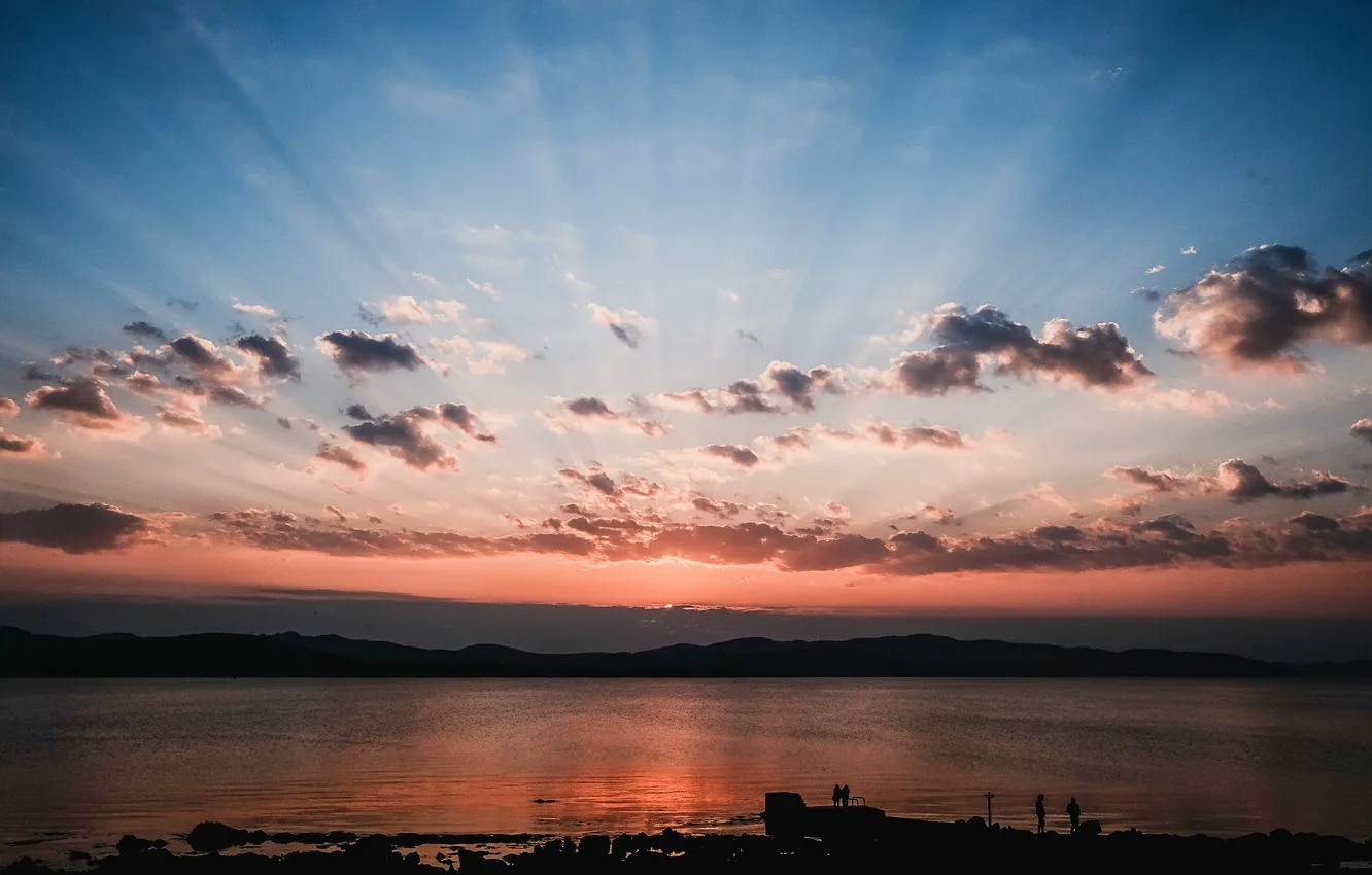 Photo wallpaper the sky, the sun, clouds, rays, sunset, lake, shore, people