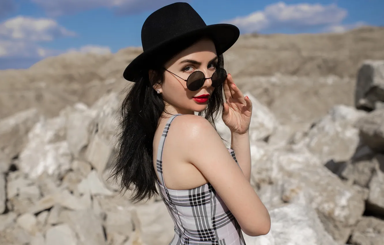 Photo wallpaper girl, sky, dress, clouds, rocks, model, brunette, red lipstick