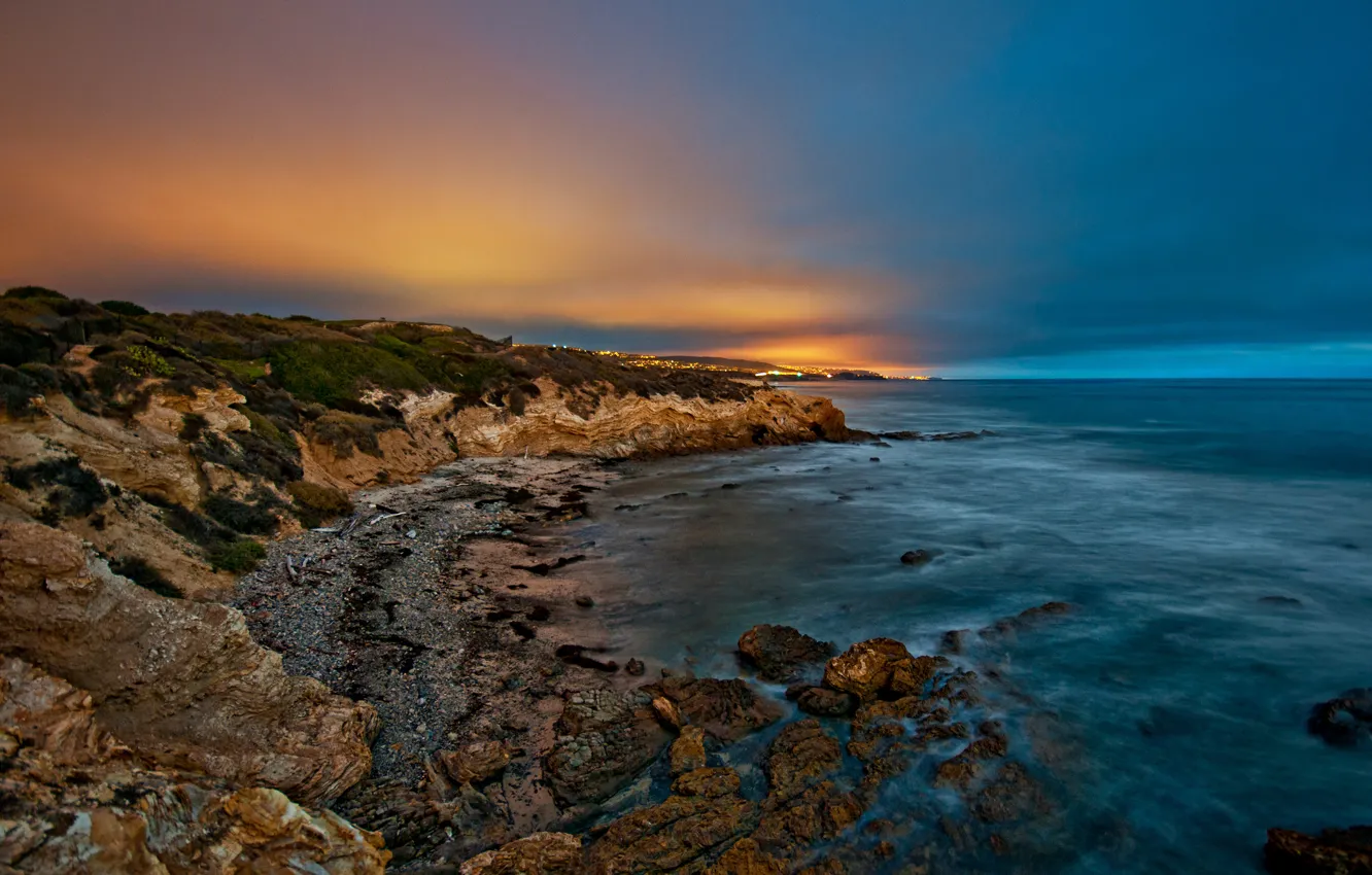 Photo wallpaper sea, sunset, lights, stones, shore, the evening, twilight
