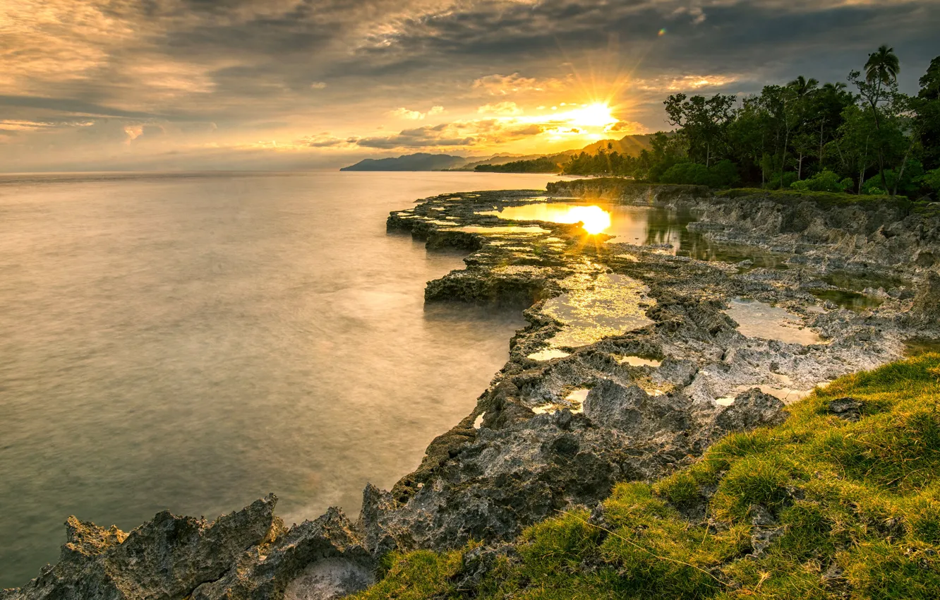 Photo wallpaper sea, the sun, rays, light, trees, sunset, bright, rocks