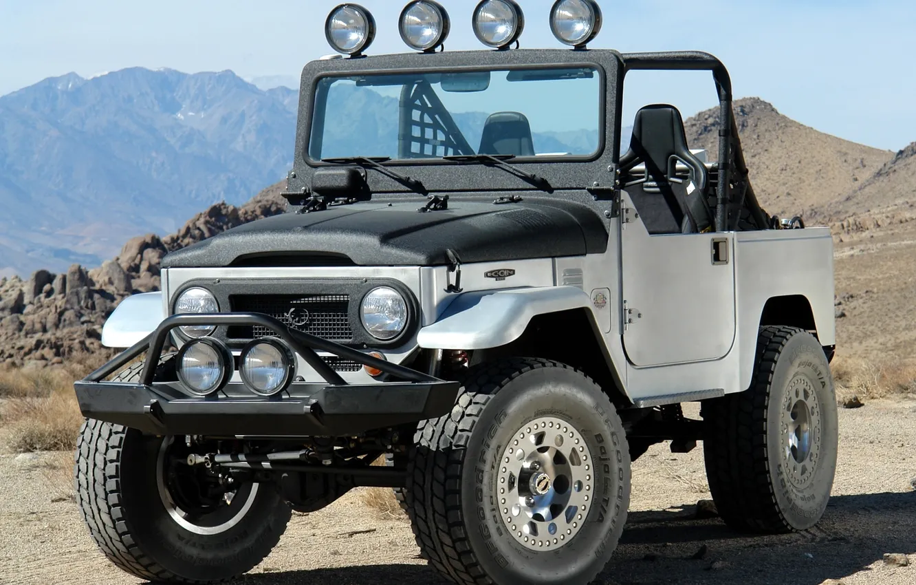 Photo wallpaper the sky, mountains, tuning, jeep, SUV, Toyota, tuning, the front