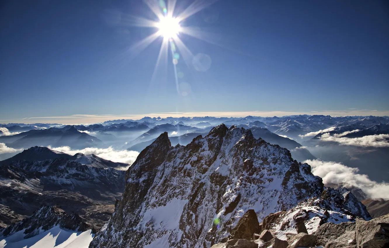 Photo wallpaper the sky, the sun, rays, snow, mountains, tops