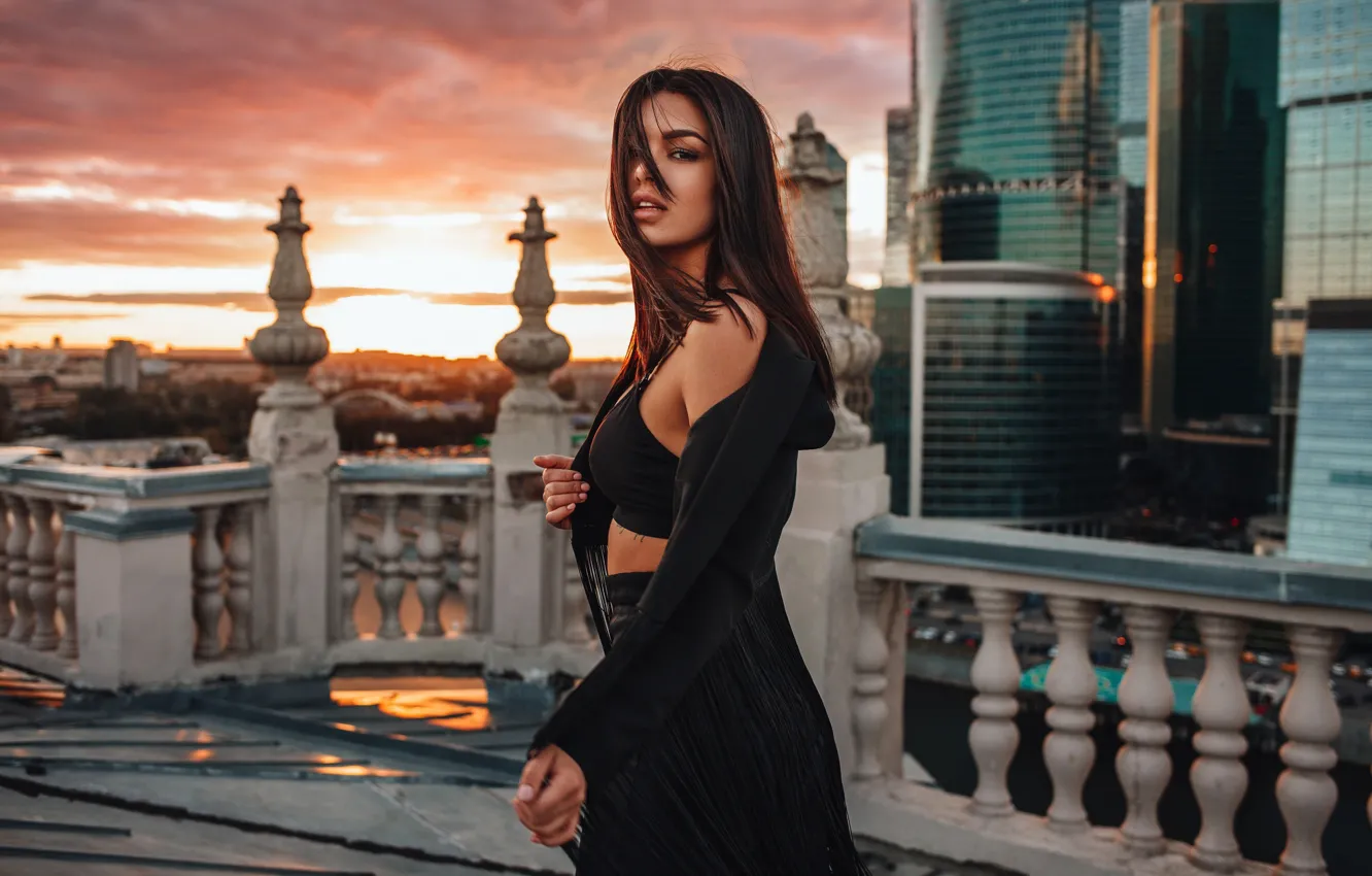 Photo wallpaper chest, the sky, girl, sunset, the city, pose, hair, skyscrapers