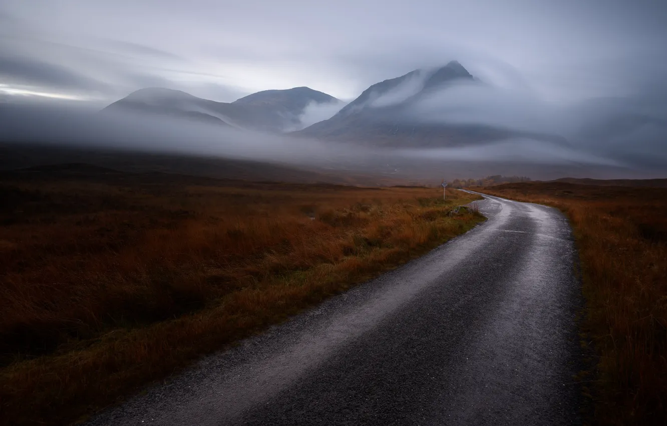 Photo wallpaper road, field, sign, mountains, clouds, fog, mist, countryside scene
