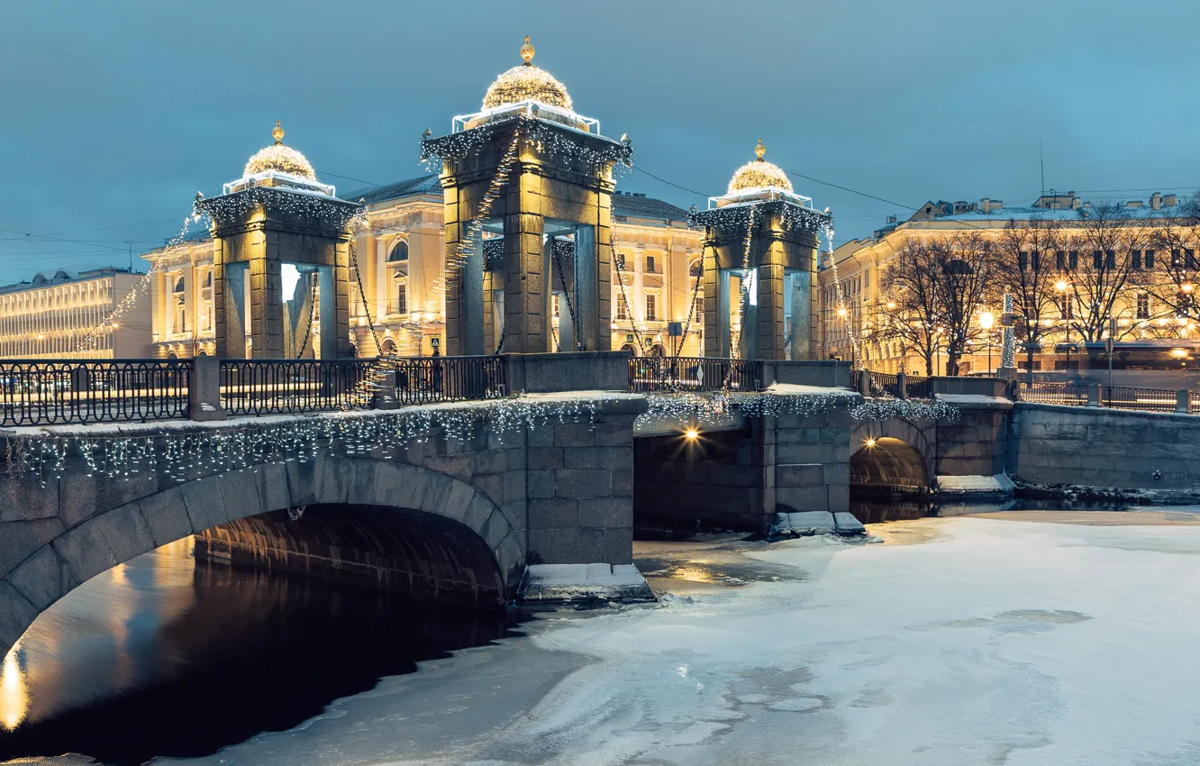 Photo wallpaper winter, snow, trees, bridge, the city, lights, river, building