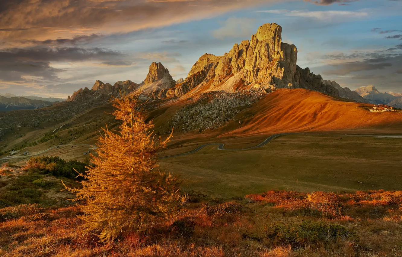 Photo wallpaper road, field, autumn, clouds, light, mountains, rocks, tops