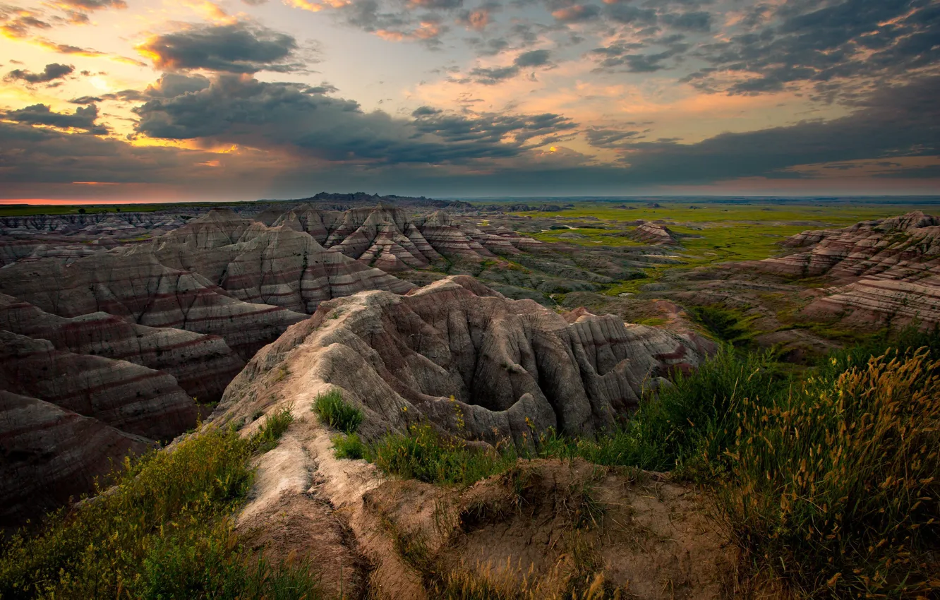 Photo wallpaper the sky, clouds, rocks, dawn, horizon, USA, Prairie, Badlands National Park