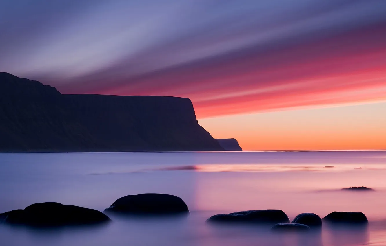 Photo wallpaper sea, the sky, clouds, mountains, stones, rocks, glow