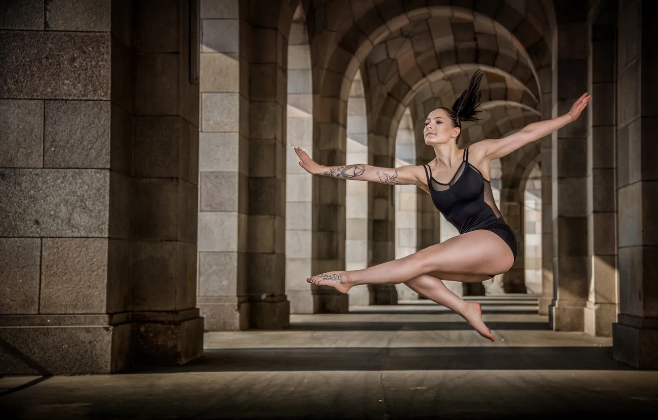 Photo wallpaper girl, light, pose, jump, building, dance, shadow, tattoo