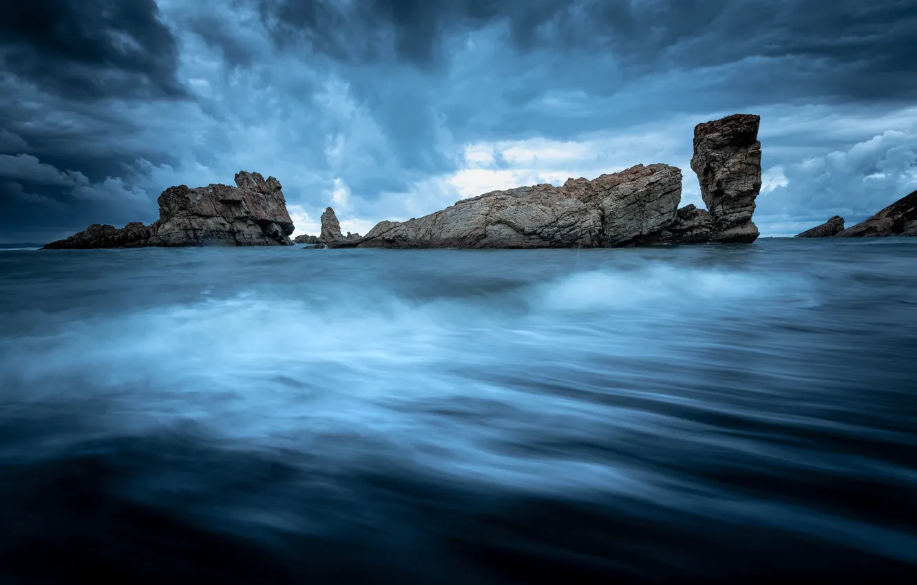 Photo wallpaper sea, wave, the sky, clouds, clouds, stones, overcast, rocks