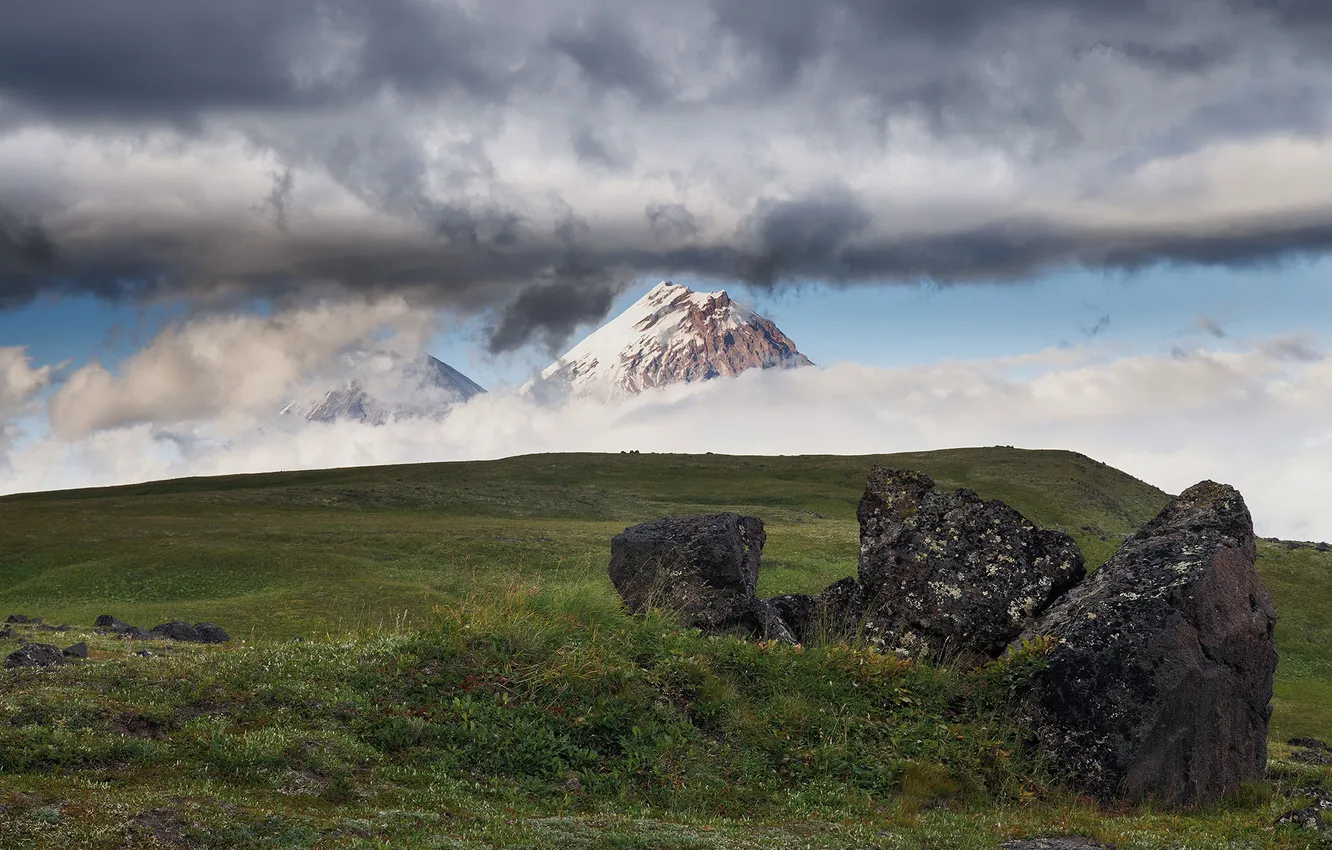 Photo wallpaper clouds, green grass, the volcano, space, Kamchatka, boulders, Sergey Morozov
