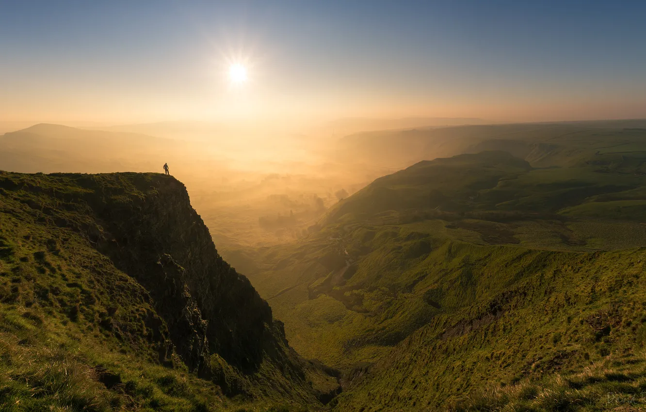 Photo wallpaper the sun, rays, mountains, open, rocks, dawn, hills, people