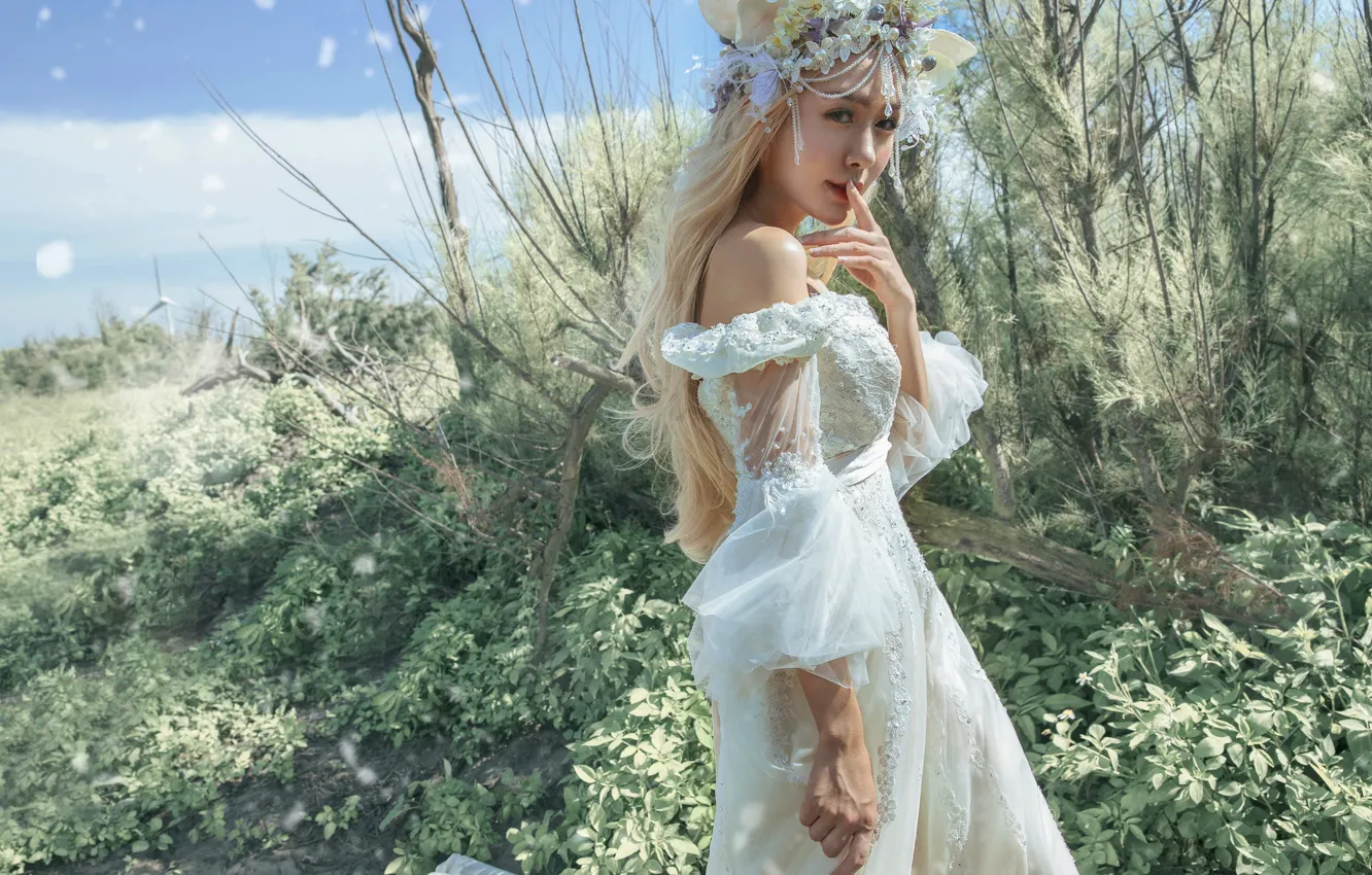 Photo wallpaper look, girl, branches, nature, face, style, thickets, portrait