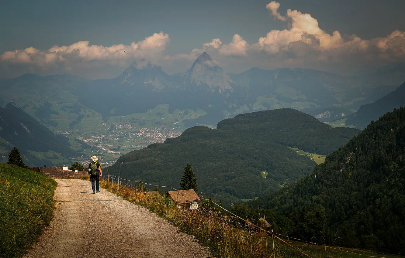 Photo wallpaper road, forest, clouds, mountains, fog, tops, people, dal