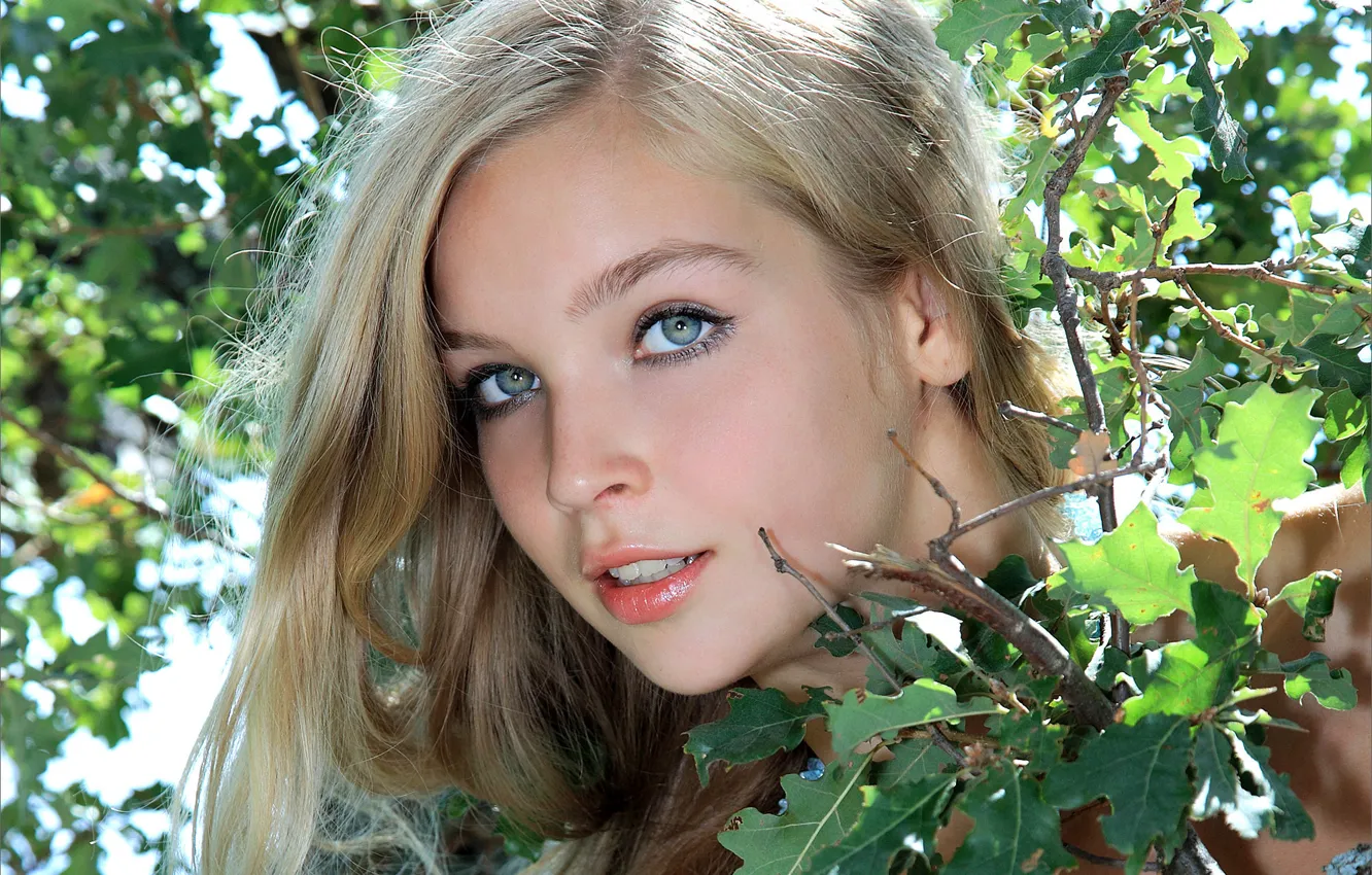 Photo wallpaper summer, leaves, girl, face, model, hair, branch, blonde