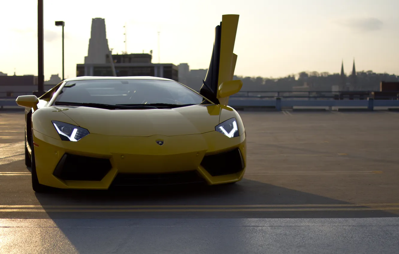 Photo wallpaper the sky, yellow, the city, building, shadow, the evening, Lamborghini, yellow