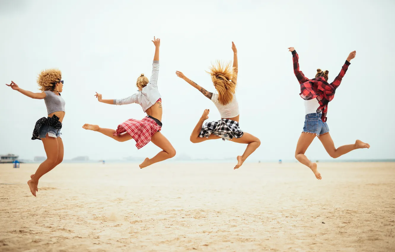 Photo wallpaper sand, sea, beach, girls, shorts, barefoot, hairstyles, poses